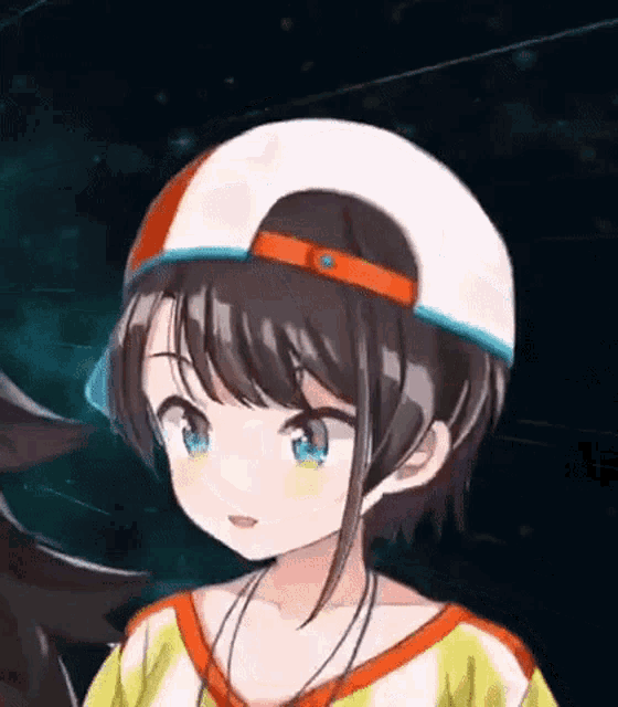 a close up of a girl wearing a helmet and a shirt .