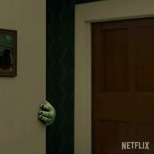 a netflix ad shows a hand sticking out of a door