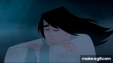 a cartoon character with long black hair is sleeping in a bed with his eyes closed .