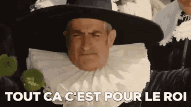 a man wearing a black hat and a white collar says tout ca c'est pour le roi .