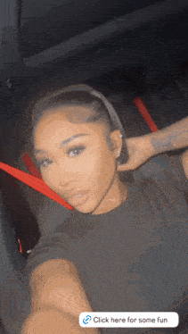 a woman taking a selfie in a car with a click here for some fun button below her