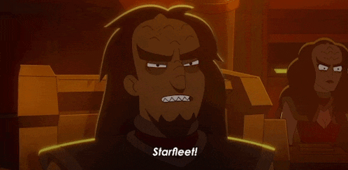 a cartoon character says starfleet in front of a woman