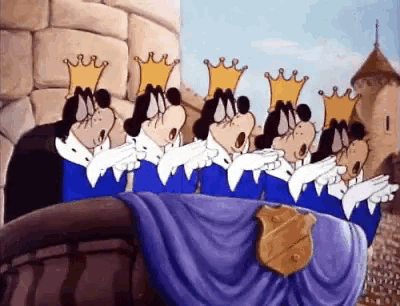 a group of mickey mouse cartoon characters wearing crowns are singing .