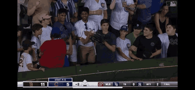 a baseball game between the cubs and the yankees is being played