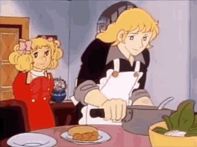 a man is cooking while a girl looks on