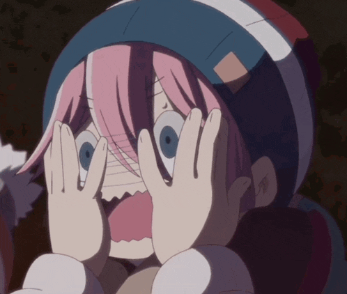 a girl with pink hair is making a surprised face