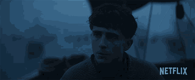 a man 's face is shown in a netflix advertisement
