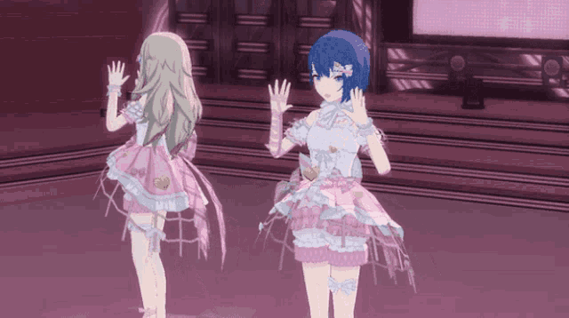 two anime girls are standing next to each other