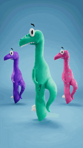 three stuffed dinosaurs standing next to each other on a blue surface