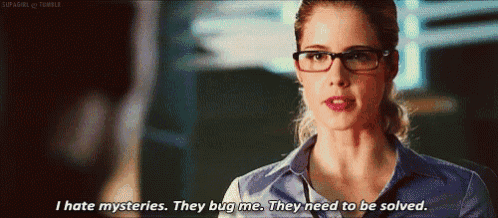 a woman wearing glasses says i hate mysteries they bug me they need to be solved