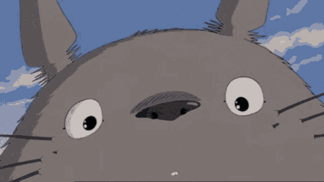 a close up of a cartoon character with a big smile on his face