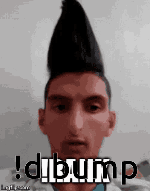a man with a mohawk has the word dibump written on his face