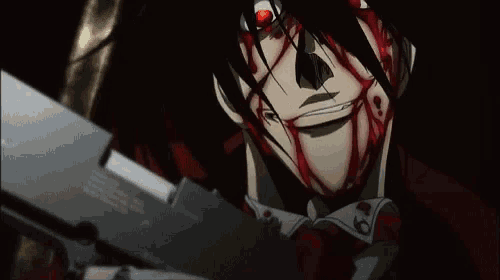 a person with blood on their face is holding a gun .