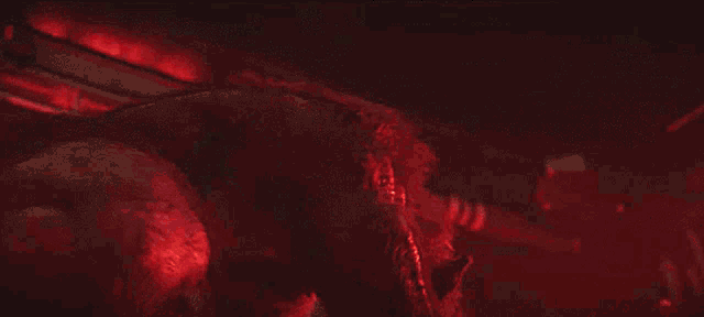 a close up of a werewolf with its mouth wide open
