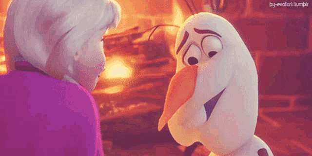 elsa and olaf from frozen are hugging each other in front of a fireplace .