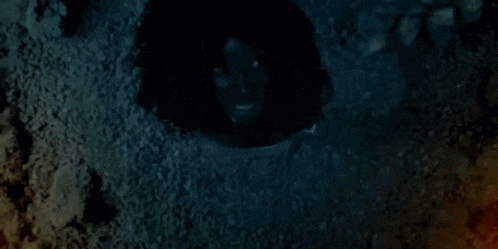 a dark room with a hole in the center