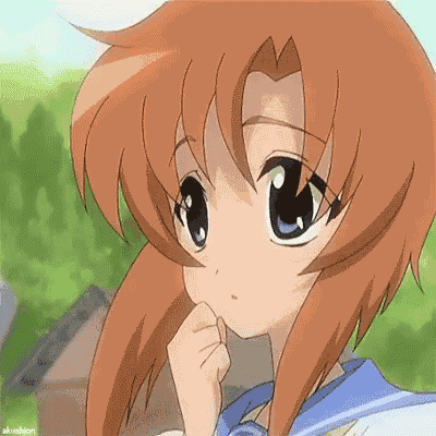 a close up of a girl 's face with a hand on her chin
