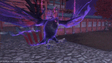 a purple bird is flying through the air in front of a building .