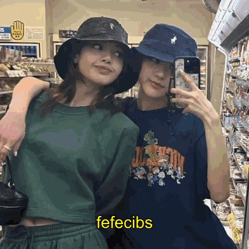 two girls are posing for a picture in a store and one of them is wearing a polo hat