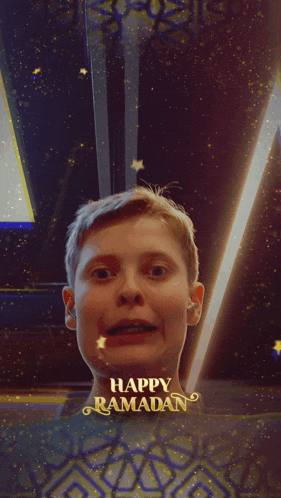 a young boy 's face is behind a happy ramadan banner
