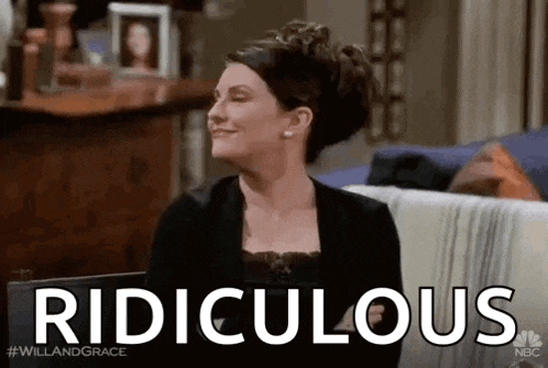 a woman is sitting on a couch and smiling with the word ridiculous written on the screen .