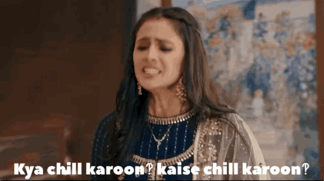 a woman in a blue dress is making a funny face with the words kya chill karoon ? kaise chill karoon ?