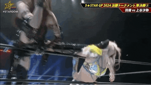 a female wrestler is being pinned by a male wrestler in a ring .