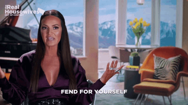 a woman says " fendi for yourself " in front of a piano