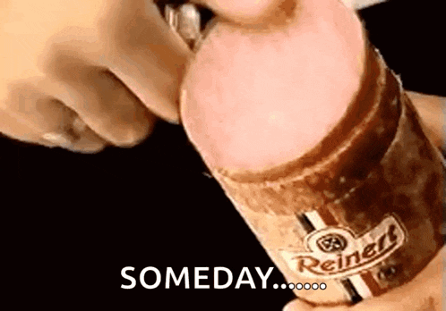 a person is opening a reinert sausage with the words someday below it
