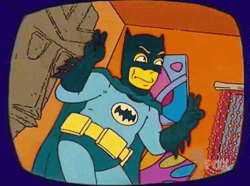 a cartoon of a man in a batman costume on a television screen