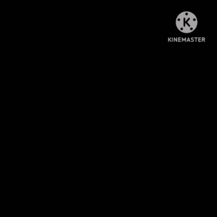 a girl wearing glasses and a red shirt is in a video taken by kinemaster