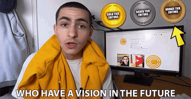 a man sitting in front of a computer with the words who have a vision in the future at the bottom