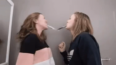 Toothbrush Toothbrush Wars GIF - Toothbrush Toothbrush Wars Paige And Holly GIFs