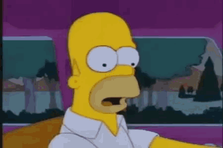 homer simpson is sitting in a car with his mouth open and his eyes closed .