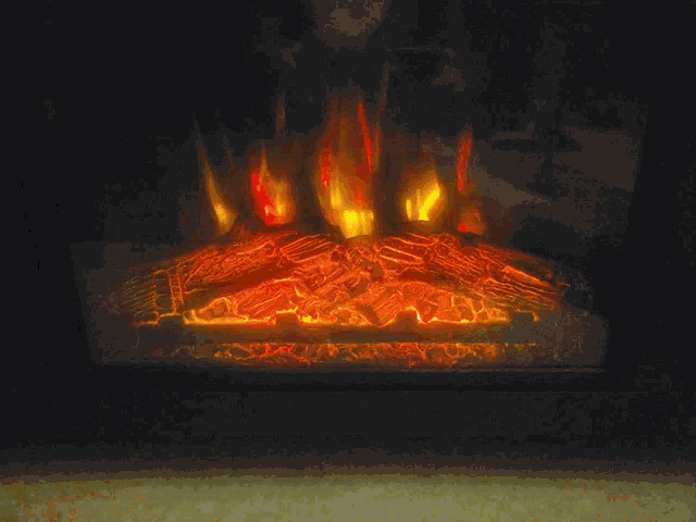 a fireplace with a red flame coming out of the middle