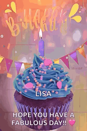 a cupcake with blue frosting and a purple candle with the name lisa on it