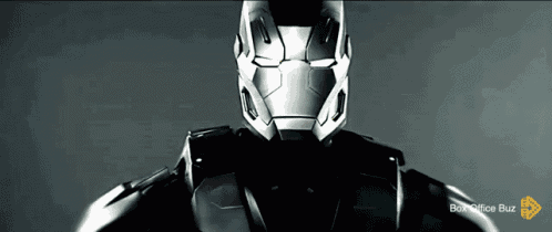 a close up of a man 's face with a box office buzz logo below it