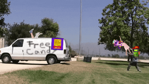 a white van with free candy written on the back