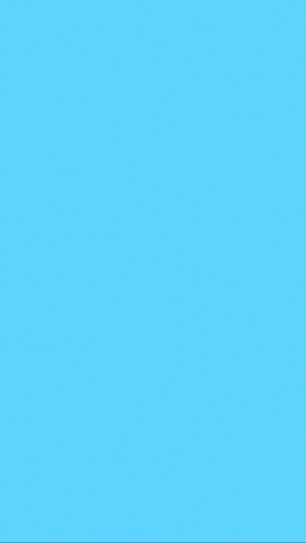 a man in a hard hat and blue shirt is dancing
