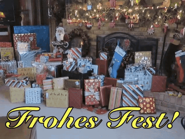 a bunch of christmas presents in front of a fireplace with the words frohes fest below them