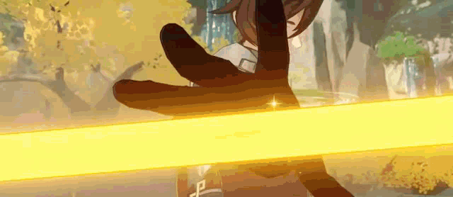 a person is holding a sword in their hand in a video game and a yellow light is coming out of their hand .