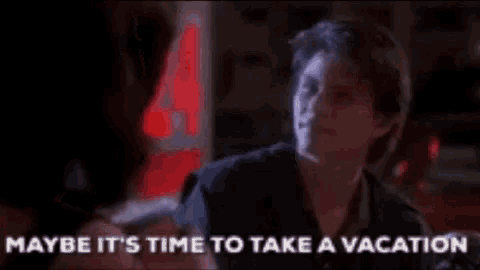 a man is talking to a woman in a bar and says maybe it 's time to take a vacation