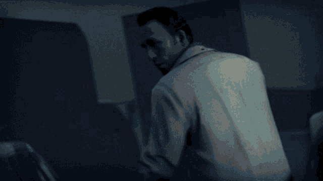 a blurry picture of a person with a fireball coming out of their mouth