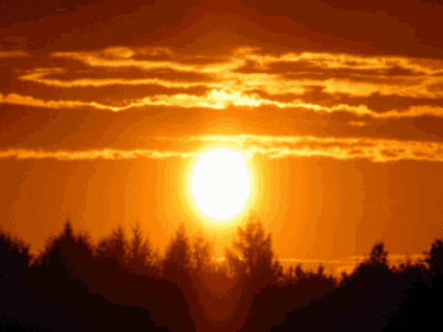 the sun shines brightly through the clouds in the sky