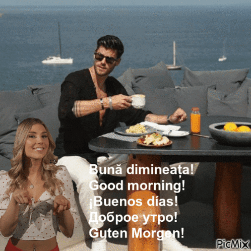 a man and a woman are sitting at a table with food and a bottle of orange juice and the words buna dimineata good morning
