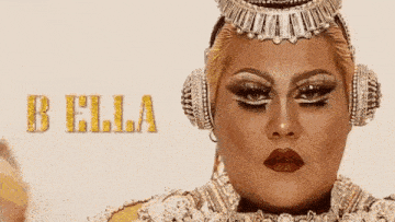a drag queen with a crown on her head and headphones on her head .