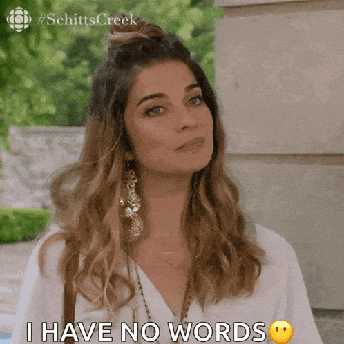 a woman says i have no words with a smiley face on her face