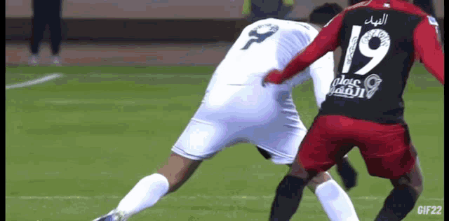 a soccer player with the number 19 on their jersey