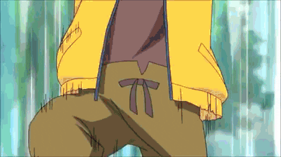 a person wearing a yellow jacket and brown pants with a purple bow