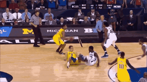a basketball game between michigan and duke